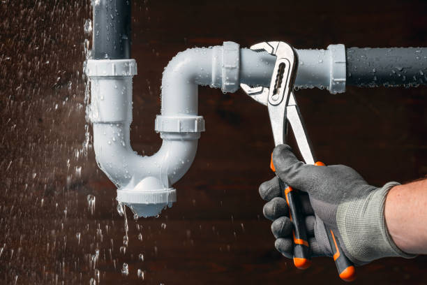 Professional Plumbing technician working in Derby, CT